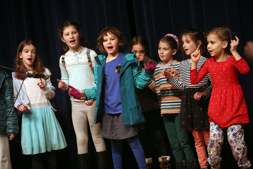 Shule kids performing